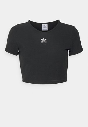 T-shirt noir court en coton, avec un col rond et des manches courtes. Le centre présente un logo Adidas brodé en blanc.