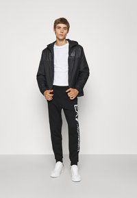 EA7 Emporio Armani TROUSER - Tréningruha alsók - black