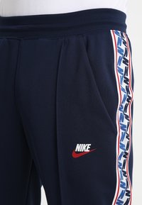 Nike Sportswear Träningsbyxor - dark blue