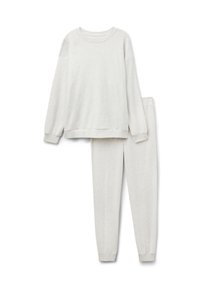 Lichtgrijze, lange mouwen sweatshirt en bijpassende taps toelopende broek. Zacht, gestructureerd oppervlak met ribgebreide manchetten en taille, minimale naden.
