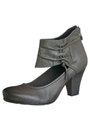Bottine femme en cuir gris foncé avec talon bloc de hauteur moyenne, détail revers plié et fermeture éclair à l'arrière.