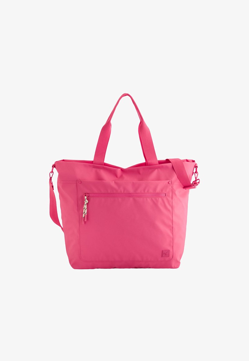Pink tote bag made of durable fabric, featuring two short handles, an adjustable shoulder strap, and a front zippered pocket.