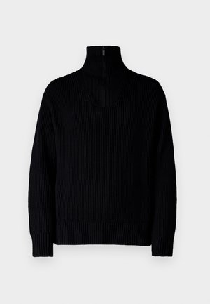 Pull en maille côtelée noir avec un demi-fermeture éclair au col, doté de manches longues et d'une coupe décontractée. La texture est douce et épaisse.