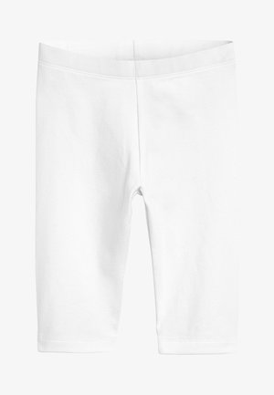 Leggings en coton blanc avec une texture lisse, ajustés au corps, atteignant la longueur mi-mollet, dotés d'une simple taille élastique.
