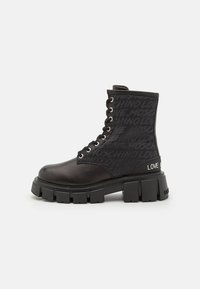 Bottines à lacets - black