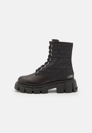 Stivaletti stringati - black