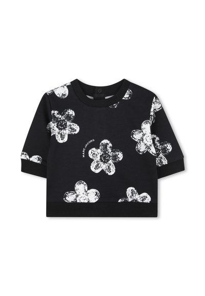 Zwarte peutertrui met korte mouwen, versierd met witte abstracte bloemprints en de tekst "Marc Jacobs" bij het centrale bloemenontwerp.