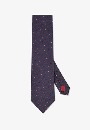 Granatowy krawat w diamentowy wzór w kolorach czerwonym i białym, pokazany z przodu oraz częściowo z tyłu, złożony.