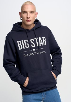 Navy blue hoodie with large white text reading "BIG STAR" and slogan below. Features a front pocket and adjustable drawstring hood.