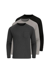 Tre magliette a manica lunga con scollo a girocollo impilate, nei colori antracite, grigio chiaro e nero, con una tasca sul petto della maglietta superiore.