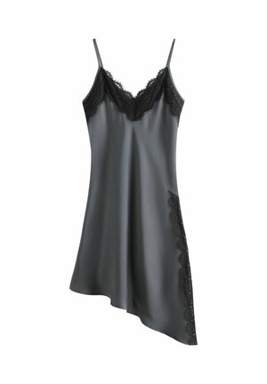 Black satin slip dress with lace trim on neckline and side, featuring thin shoulder straps and asymmetrical hem.