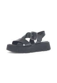 Sandali in pelle nera con suola in gomma spessa, dotati di cinturini incrociati e un accentuazione in metallo argento per una vestibilità regolabile.