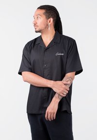 Carhartt WIP DELRAY  - Vapaa-ajan kauluspaita - black