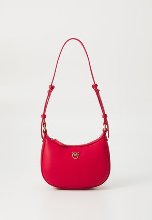 Red leather handbag with a curved shape, adjustable strap, gold hardware accents, and a small logo on the front. Smooth texture.