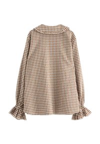 Ruskea ja valkoinen ruutupaita pitkillä hihoilla, jossa on rypytetty kaulus ja rypytetyt hihansuut, näkyy selkäpuolelta valkoista taustaa vasten.