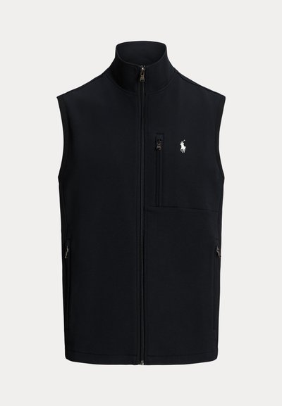 Μαύρο γιλέκο από φλις με ψηλό γιακά, εμπρόσθιο φερμουάρ, κάθετρη τσέπη στο στήθος και δύο πλαϊνές τσέπες. Διαθέτει μικρό λογότυπο στο στήθος.