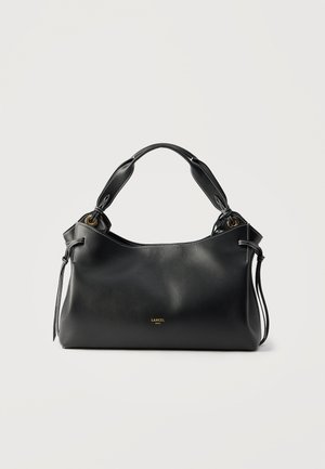 Borsa a mano in pelle nera con cuciture bianche, manici corti, lacci laterali e piccolo logo dorato "LANCEL Paris" sul davanti.