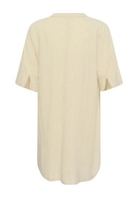 Beige tuniek met korte mouwen, zijsplitten in de mouwen, afgeronde zoom en een ontspannen pasvorm, gezien van achteren.