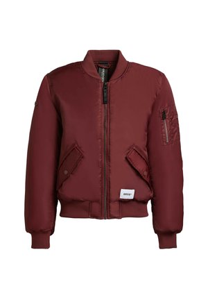 Burgundia bombersärk, millel on tõmblukk ees, ribitud varrukad ja taskute detailid. Valmistatud siledast, läikivast kangast, millel on ühtlane disain. Brand label allääres.