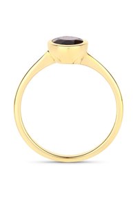 Bague en or avec une pierre précieuse ronde et sombre sertie dans une monture lisse, dotée d'un anneau fin et d'un design minimaliste.