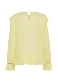 Yellow sheer blouse with soft ruffles at the sleeves and hem, keyhole back closure, and textured fabric for a light, airy feel.