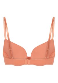 Persikofärgad vadderad bh med justerbara axelband och hysk-och-öga stängning, slät tyg, visad framifrån på en vit bakgrund.