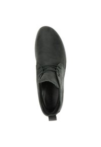 Botín negro de cuero con textura suave, puntera redondeada y cordones elásticos. Cuenta con una pequeña lengüeta en el talón para una fácil colocación.