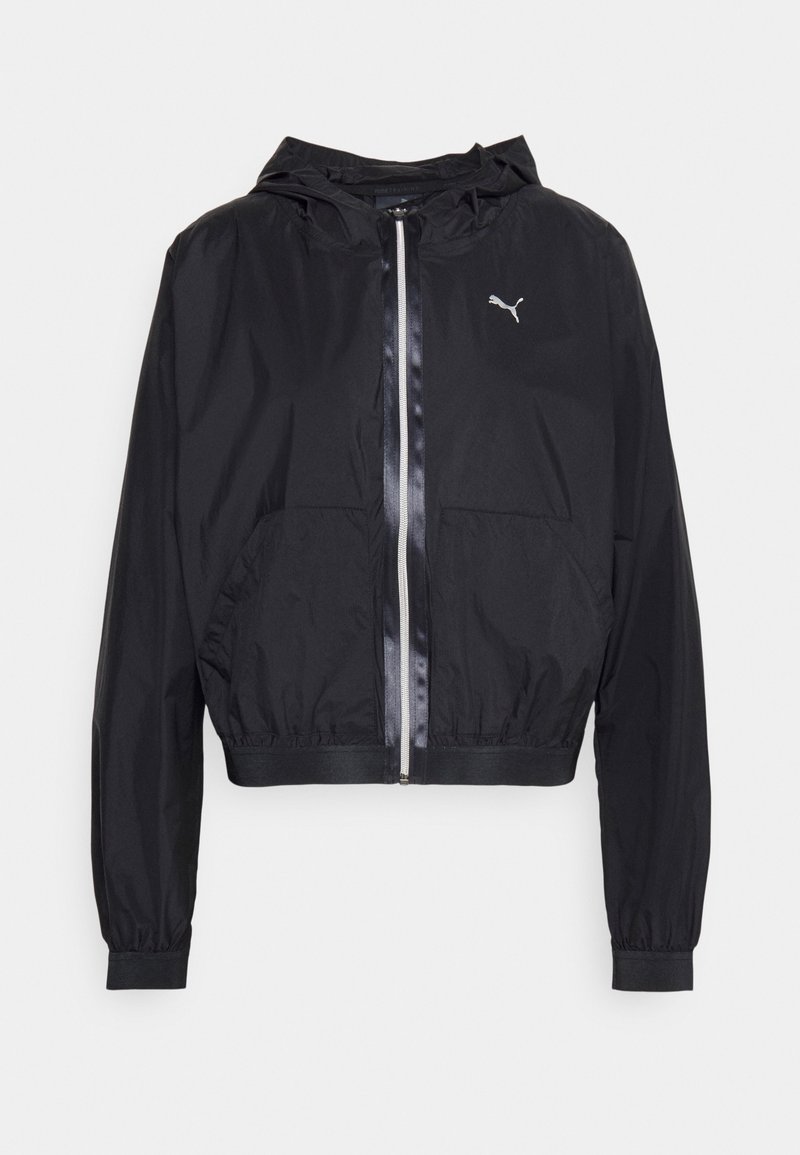 Veste coupe-vent noire avec capuche, fermeture éclair, poignets élastiques et deux poches avant. Présente un petit logo sur la poitrine gauche.