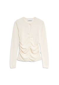 Langsleeve, ronde hals top in crème met gevouwen zijdetails en een sleutelgatopening bij de halslijn. Zacht, rekbaar materiaal.