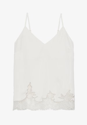 Balta be rankovių bluzonė su V formos iškirpte, aptrauktas nėriniu prie apatinio krašto su banguota tekstūra. Lygi tekstūra ir minimalistinis dizainas.