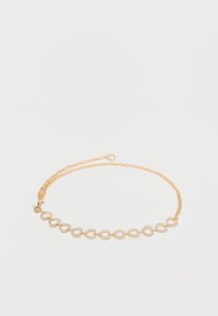 Öv - light gold-coloured