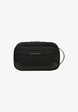 Black multifunctional bag with a textured finish, zip closure, external pocket, subtle red accent, and a streamlined design.