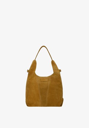Brown suede shoulder handbag with a single strap and a rectangular stitched logo patch on the front center.