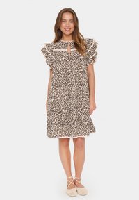 Leopardenmuster-Kleid in Beige und Braun, mit Rüschensäumen, einem Schlüsselloch-Ausschnitt und einer lockeren Passform, mit einem Saum, der knapp über den Knien endet.