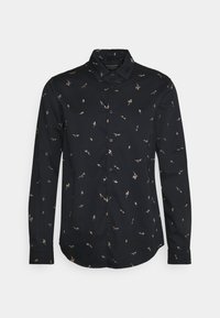 Czarna koszula na długi rękaw z guzikami, ozdobiona drobnymi beżowymi kwiatowymi wzorami równomiernie rozmieszczonymi na tkaninie, z klasycznym kołnierzykiem.