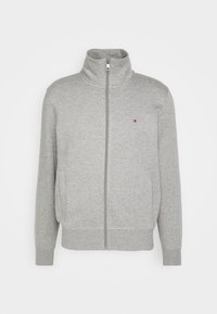 Gray zip-up sweatshirt with a high collar, side pockets, and ribbed cuffs. Features a small logo on the left chest. Made from soft fabric.