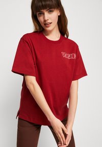 Puma Tričko s potlačou - intense red