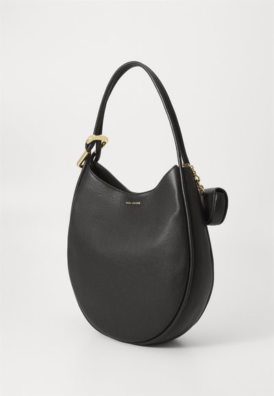 Black leather rounded tote bag with single shoulder strap, gold hardware, and small attached pouch, Marc Jacobs logo on front.