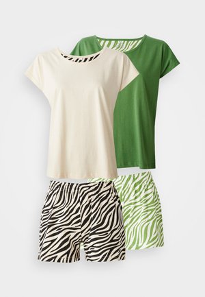 Twee T-shirts: één crème met een zwart-wit gestreepte kraag, één groen. Twee paar shorts: zwart-wit zebra print, groen met witte strepen.