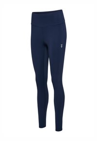 Marineblaue Leggings mit hoher Taille, schlanker Passform und kleinem reflektierendem Doppel-Chevron-Logo am linken Oberschenkel.