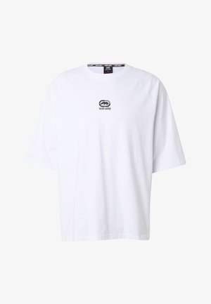 Biele oversize tričko s krátkymi rukávmi a malým čiernym logom "eckō unltd." so žirafou v strede prednej časti.