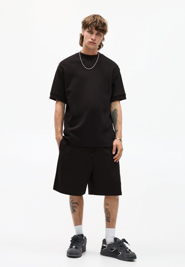 INTERLOCK JOGGER - BERMUDA - Jogginghose