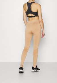Smilodox Leggings - bronze