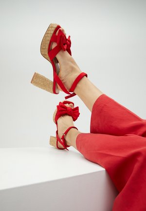 High heeled sandals - red