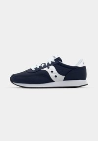 Navy blue athletic shoe featuring a white panel and holes, white laces, a textured upper, and a rubber sole with a contrasting black tread.