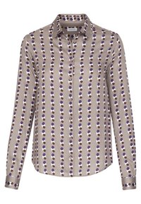 Långärmad skjorta med knappstängning i slät beige tyg med ett återkommande mönster av lila, vita och bruna prickar. Klassisk krage och manschetter.