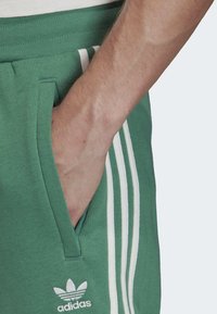 adidas Originals Teplákové kalhoty - turquoise