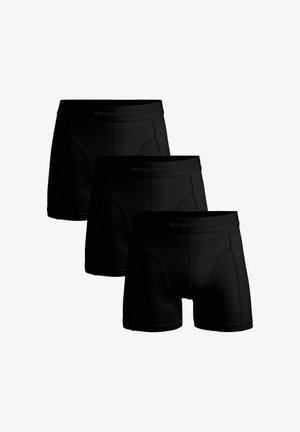 Tri para crnih bokserica izrađenih od glatkog, rastezljivog tkanja. Imaju mekani pojas s logotipom "MUCHACHO MALO" i nemaju vidljive šavove.