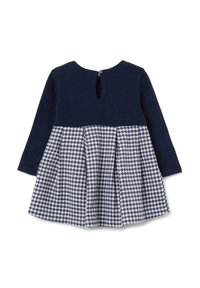 Abito lungo a maniche con tessuto a coste in blu navy e gonna plissettata a motivo pied de poule, con chiusura a bottone sul retro e dettaglio a chiave.