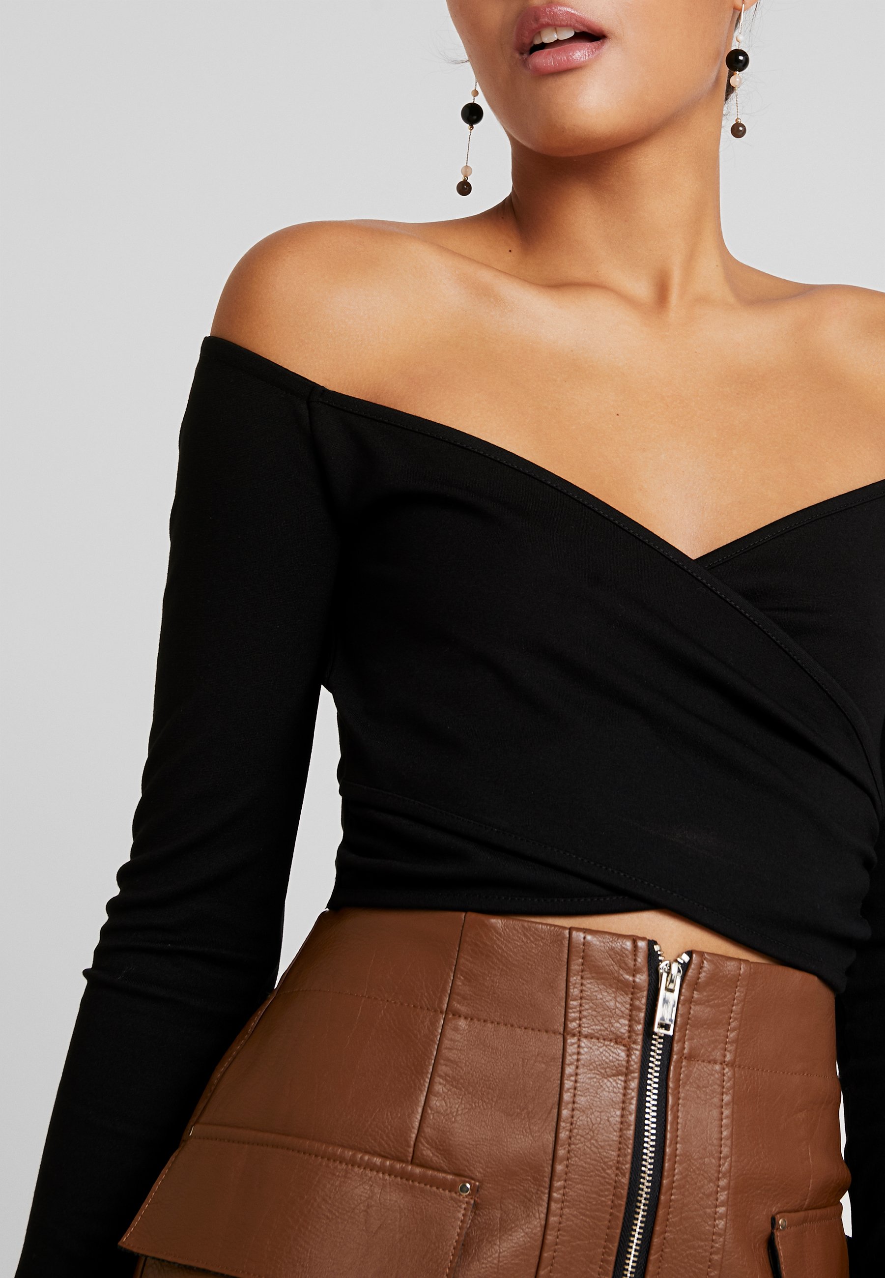 black off the shoulder wrap top